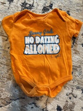 Orange Baby One-Piece Bodysuit with 'No Dating Allowed' Graphic